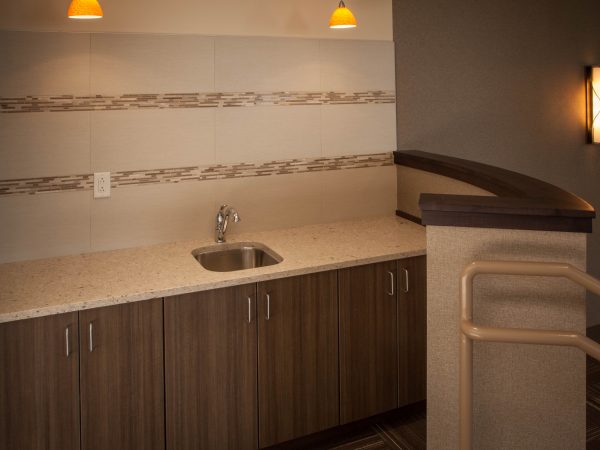 marble countertop with faux wood bottom cabinets