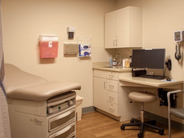 beige medical cabinet and counter