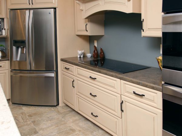 off white cabinets and laminate countertop in new kitchen