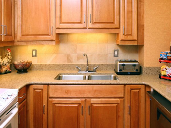 wooden kitchen cabinets and granite countertop