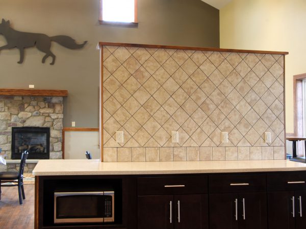 quartz countertop and wooden drawers in restaurant