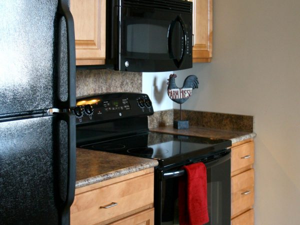 small wooden cabinets in kitchen