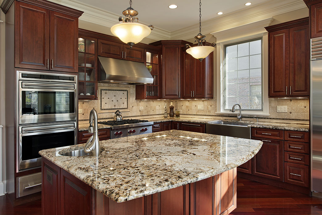 Granite Counters Installed with Dark Cabinetry