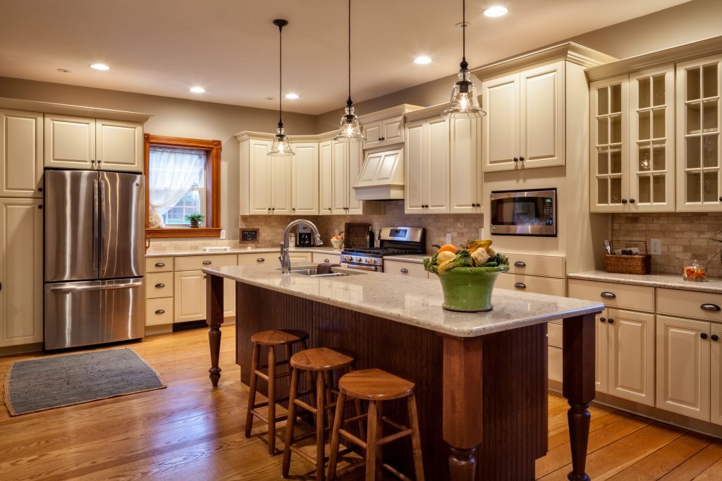 cream kitchen cabinets with quartz countertop