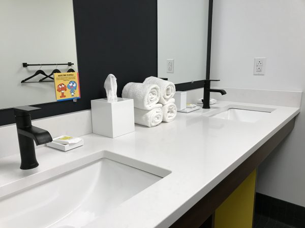 large commercial bathroom in cartoon network hotel