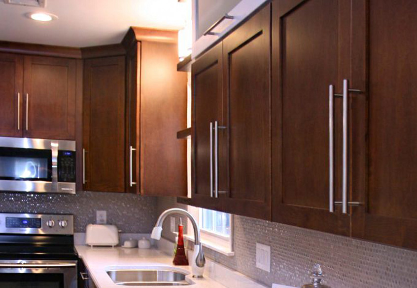 Renovated natural wood kitchen cabinets