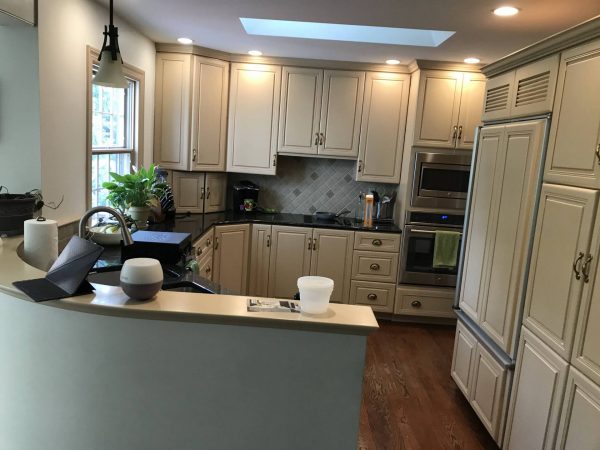 newly installed tan kitchen cabinets