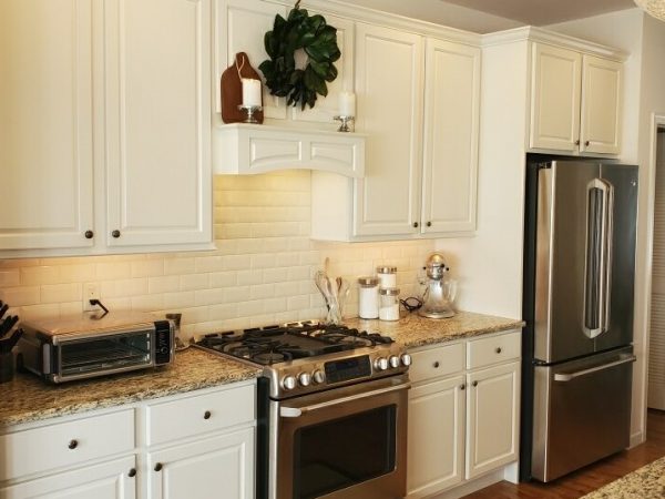 white kitchen overhead kitchen cabinets with granite countertops