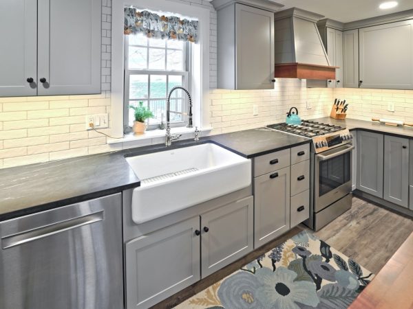 deep farmhouse sink and gray drawers