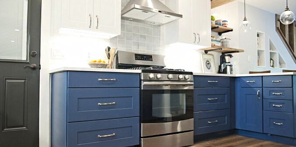 Two tone kitchen cabinets with blue and white