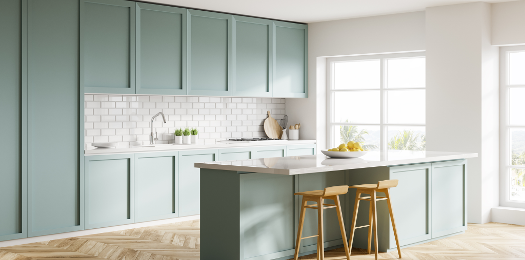 Light and airy green cabinets in kitchen
