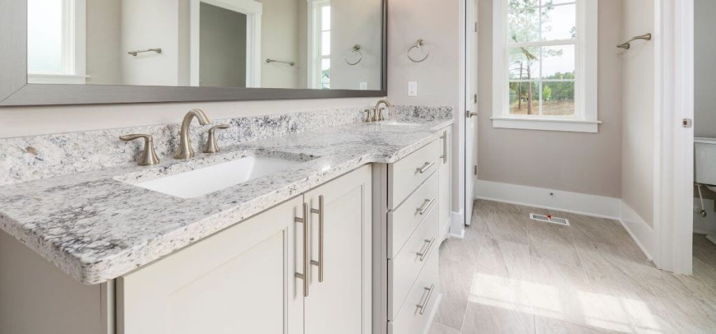 custom speckled gray corian bathroom sink and countertop